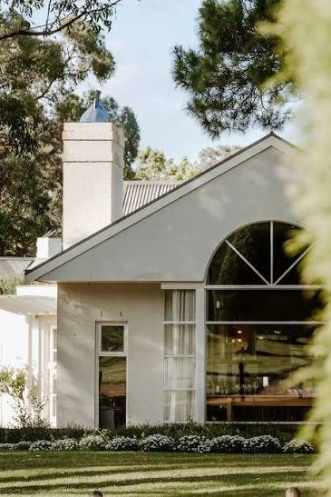 Lancemore Lindenderry Red Hill, the white homestead wing with its arched window