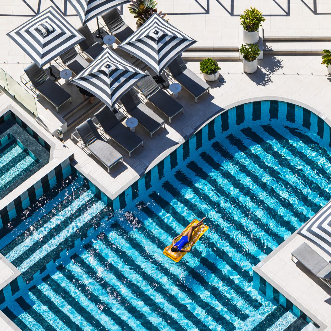 QT Gold Coast, the striped pool deck from above
